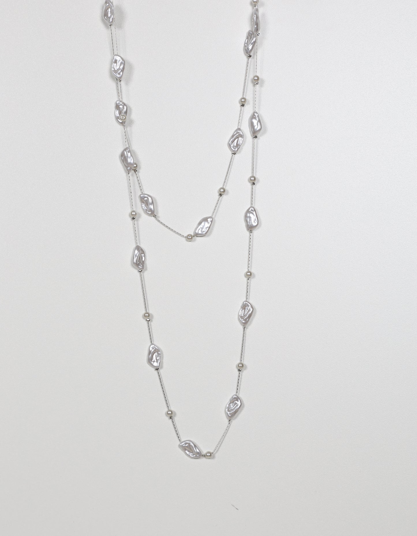 Long Pearl Necklace with Irregular Pearl Accents