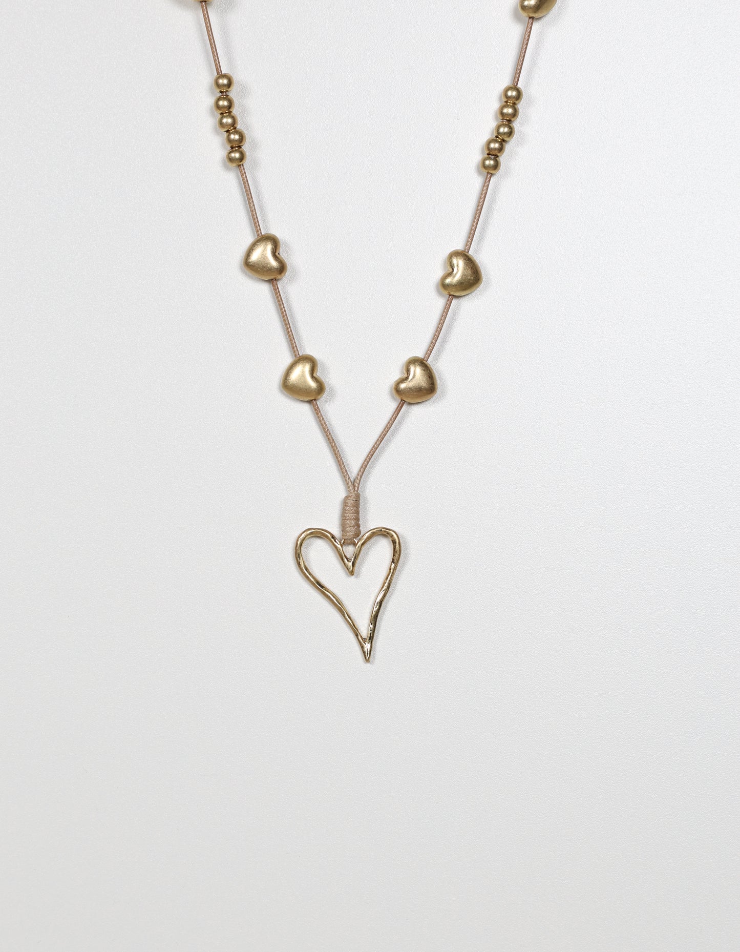 Gold Cord Necklace with Layered Heart and Ball Details