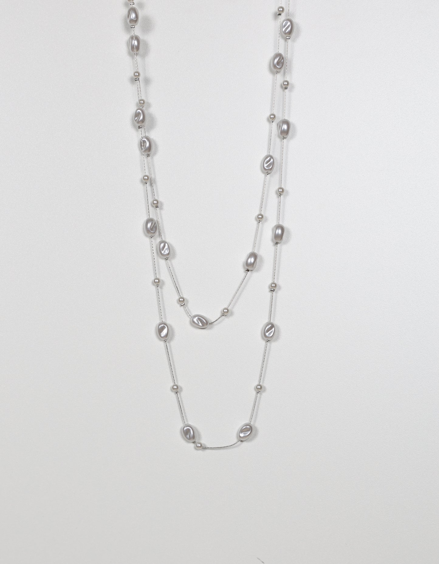 Long Pearl Necklace with Rock-Shaped Accents