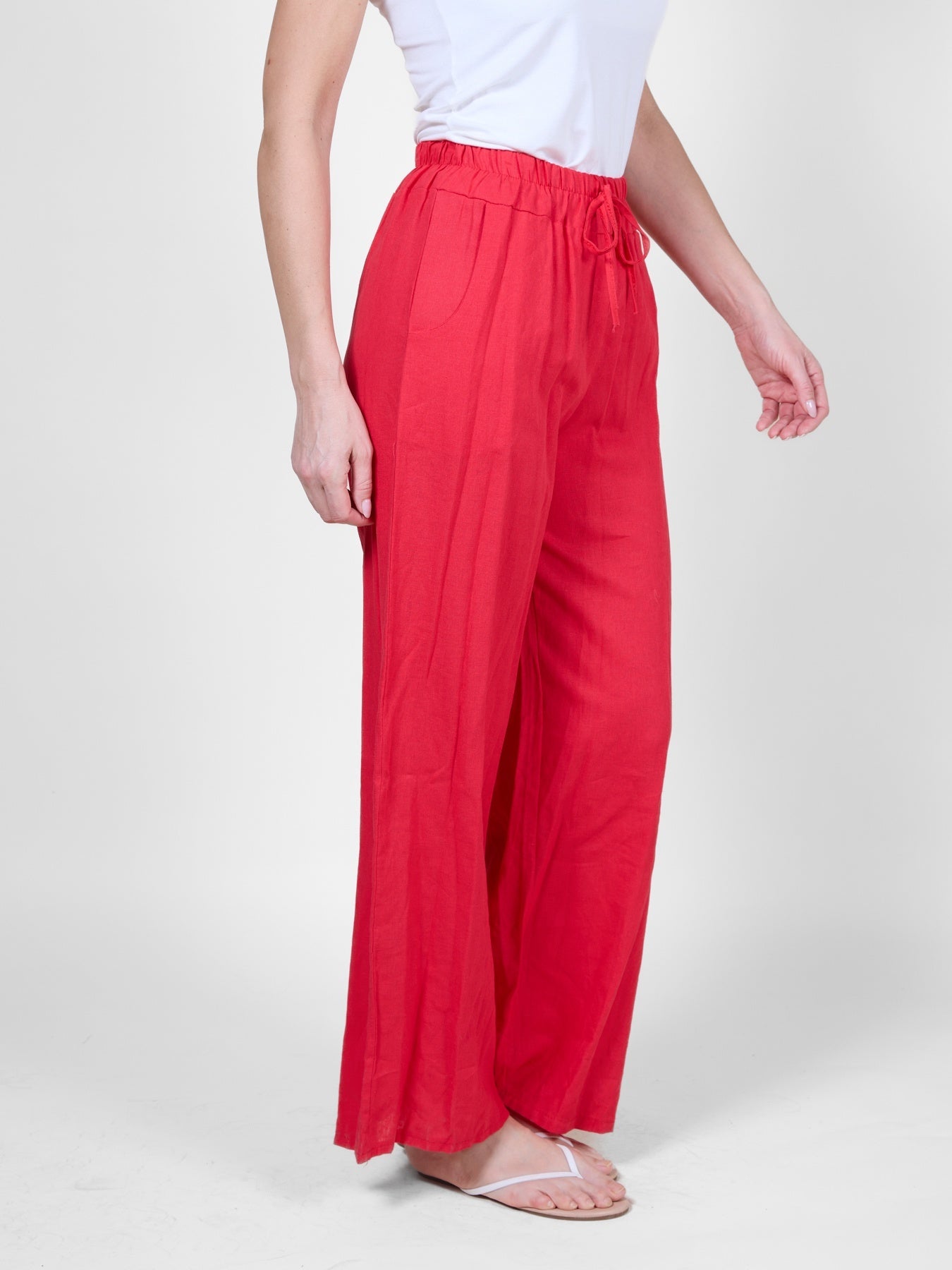 Pantalon fluide rouge à taille coulissante avec poches