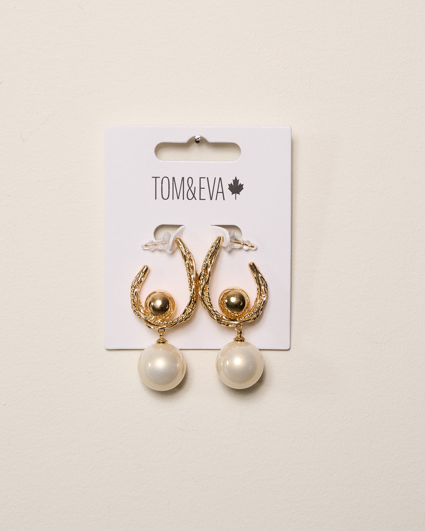 Boucles d’oreilles demi-créoles avec perles en forme de billes