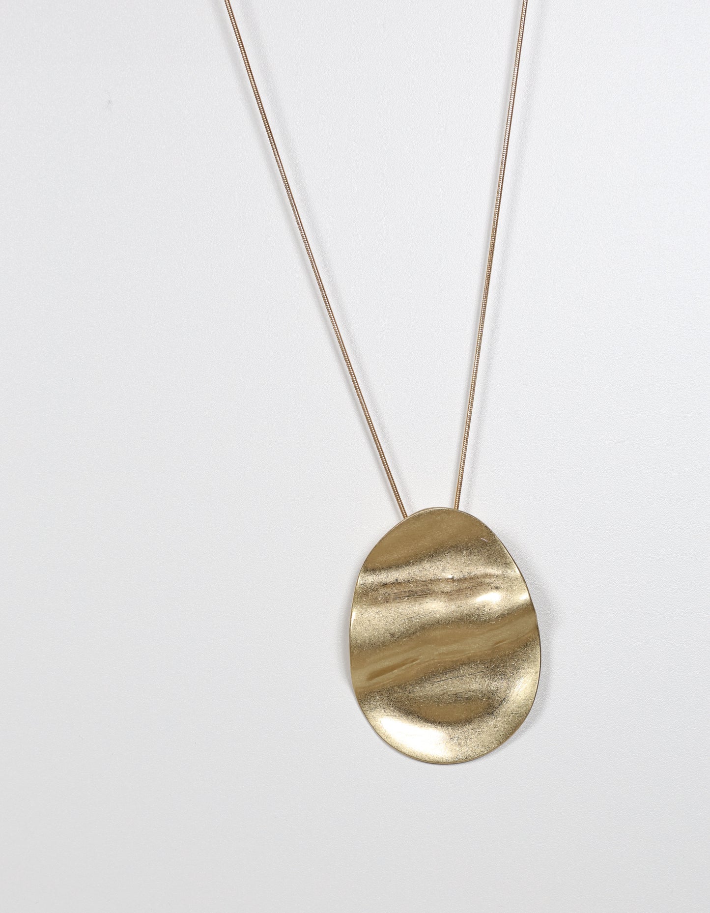 Gold Necklace with Rippled Oval Pendant