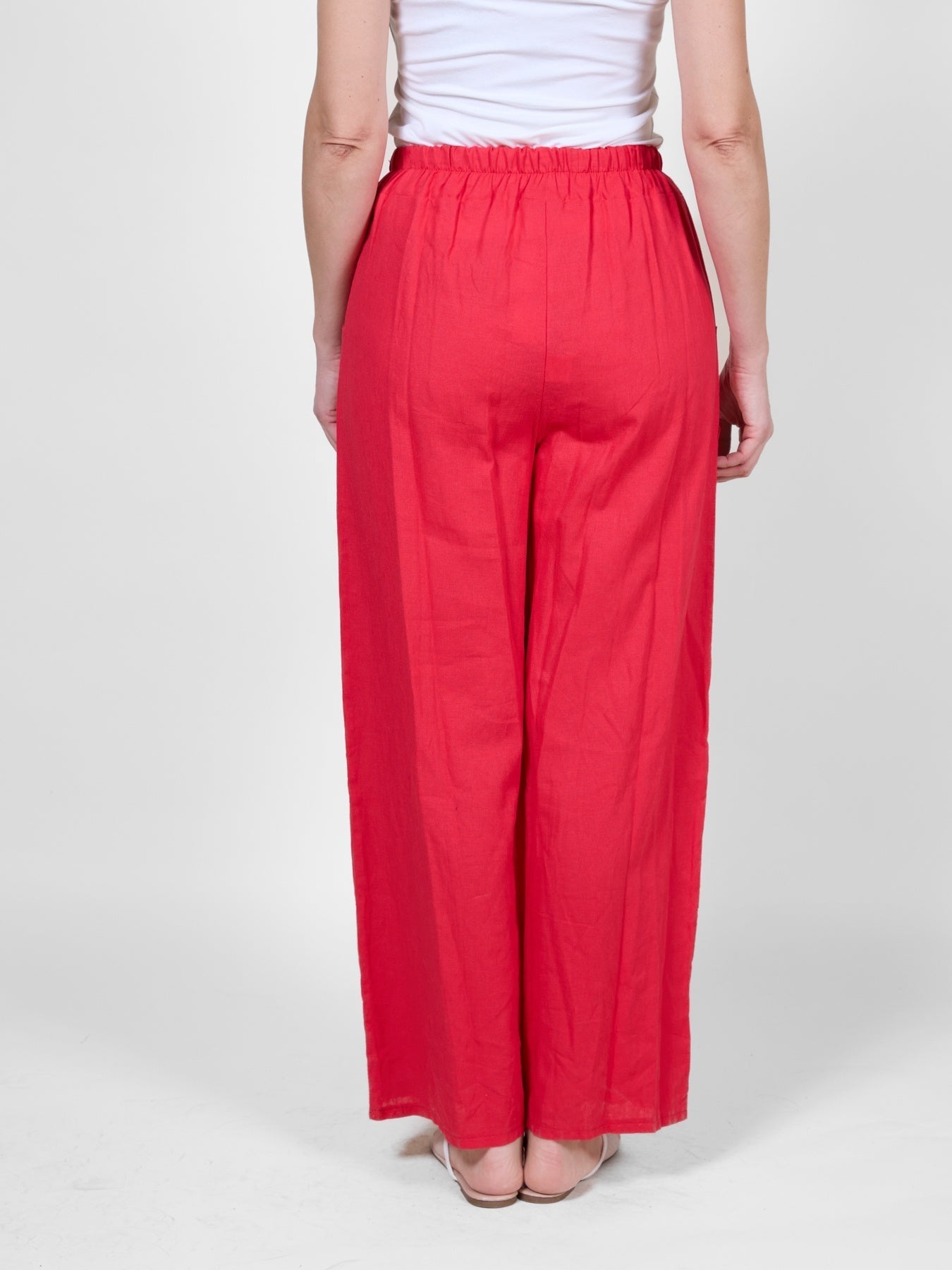 Pantalon fluide rouge à taille coulissante avec poches
