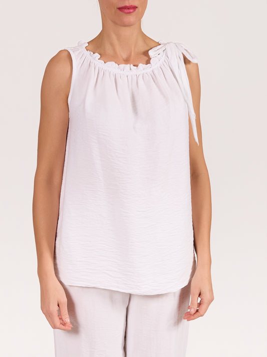 White Sleeveless Top with Ruffled Neckline and Side Tie