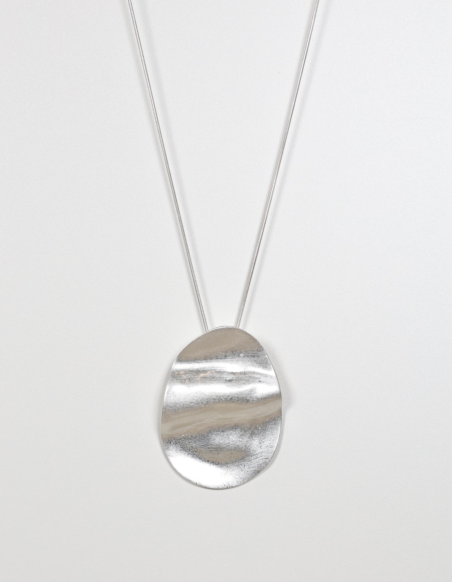 Silver Necklace with Rippled Oval Pendant