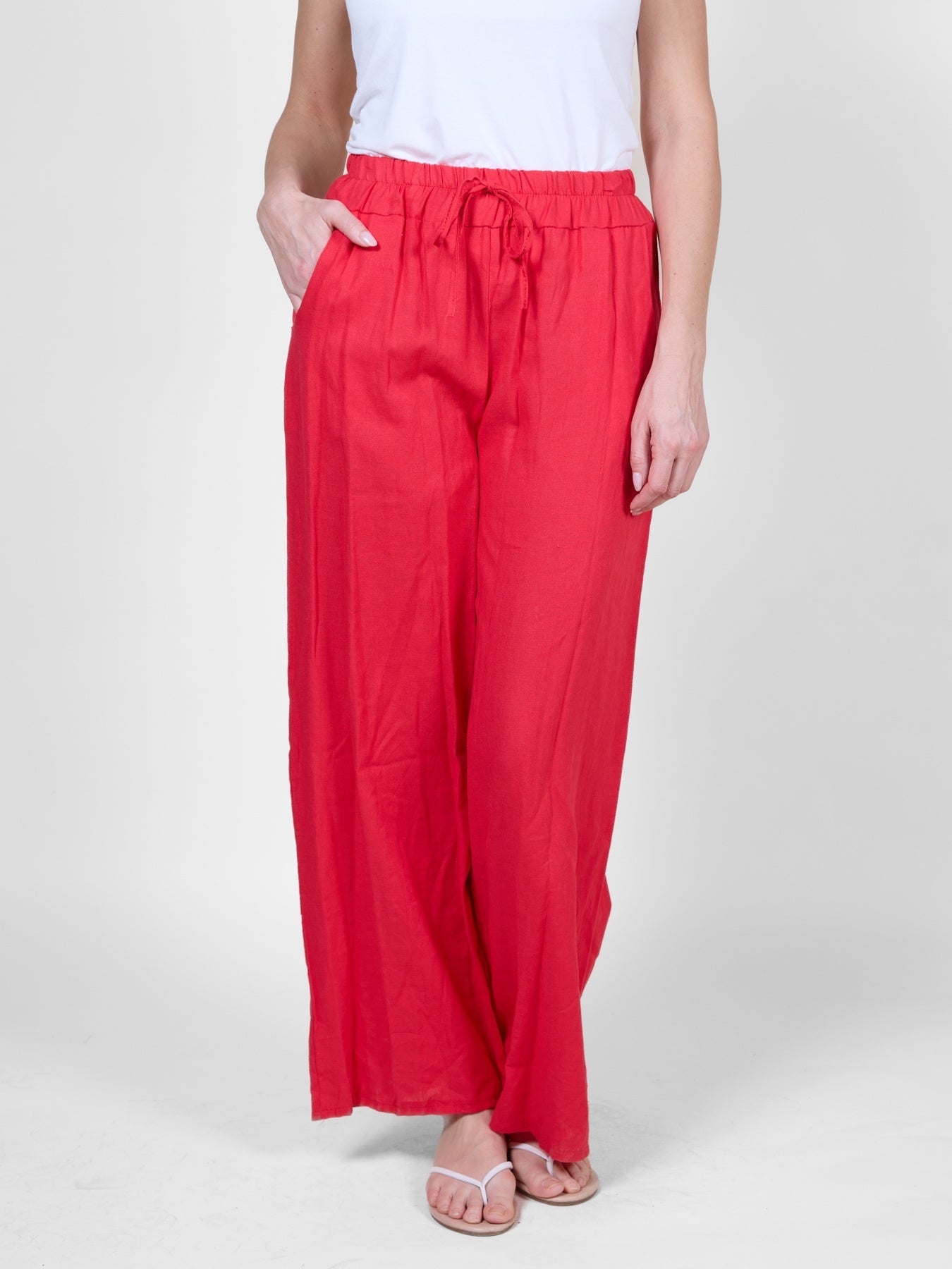 Pantalon fluide rouge à taille coulissante avec poches